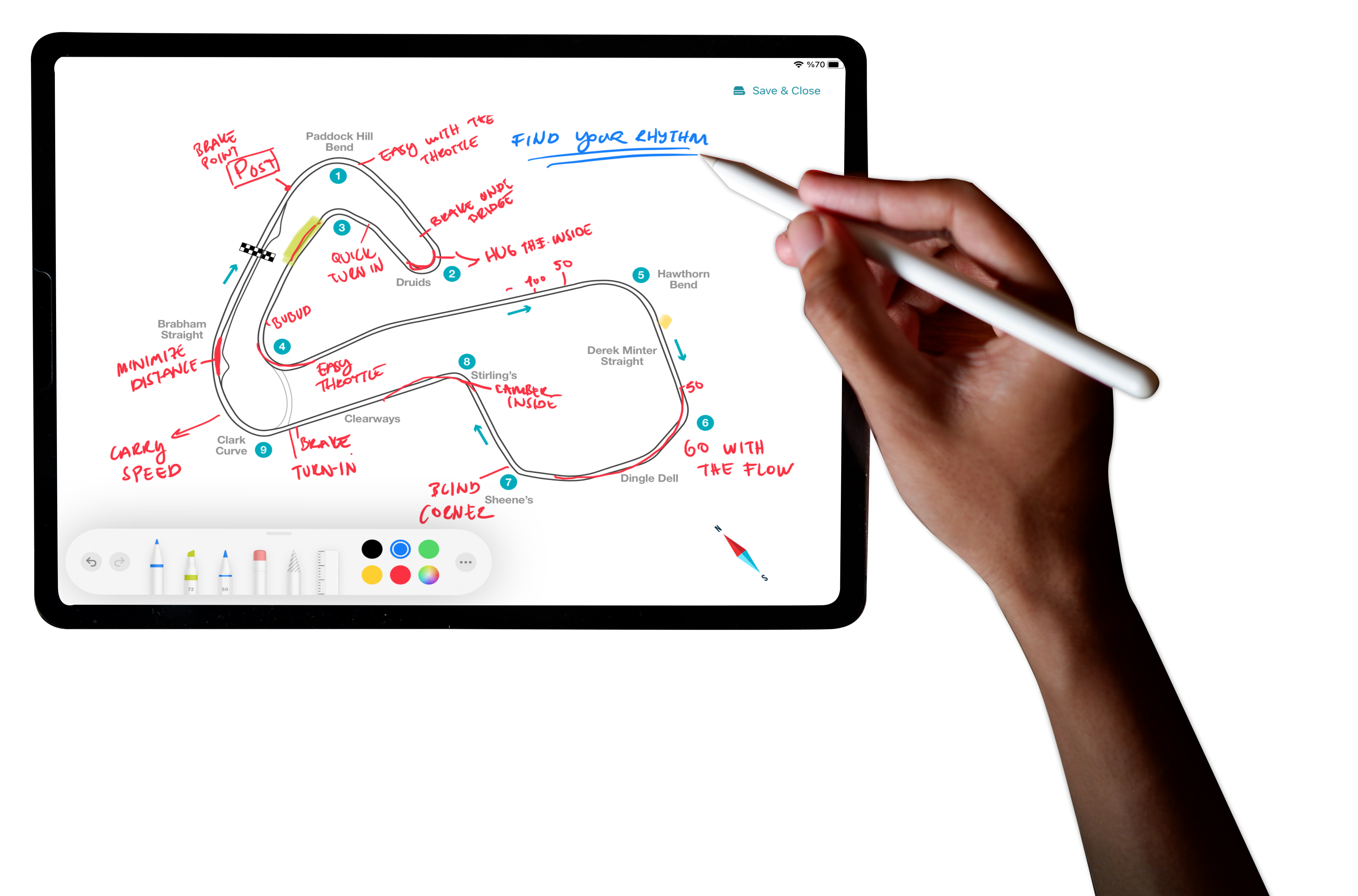 A driver annotating the Brands Hatch circuit map with an Apple Pencil in Track Maps Pro on iPad